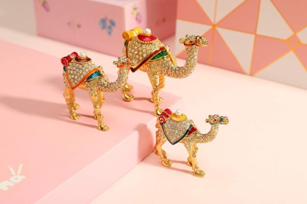 A Family of Three Gold Camels